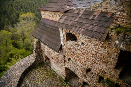 Gothic medieval castle Velhartice in sunny day, tower at the hill near forest, fortress masonry wall, old stronghold, Velhartice, National Park Sumava, South Bohemia, Czech Republic, May 29, 2021のeditorial素材