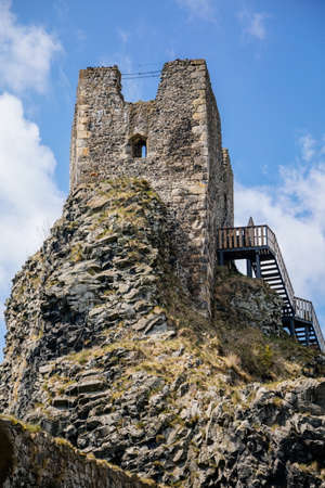 Medieval gothic castle Trosky at two basalt volcanic plugs, tower on hill in sunny day, fortress walls, fairytale stronghold, old ancient ruin in Bohemian Paradise, Czech Republic, May 08, 2021のeditorial素材