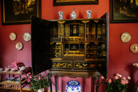 Velke Brezno, Czech Republic, 26 June 2021: chateau Velke Brezno, castle interior with baroque and renaissance furniture, oriental asian bureau with swing doors, wooden secretaire for storing jewelry.のeditorial素材