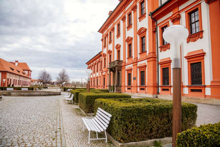 Prague, Czech Republic, 25 April 2021: Troja castle, Historical chateau and red and white baroque palace surrounded by a garden at spring day, staircase decorated with stone sculptures.のeditorial素材