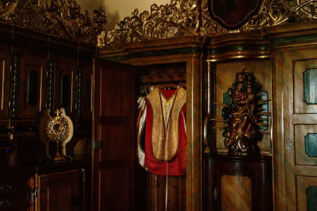 Kuks, East Bohemia, Czech Republic, 10 July 2021: Baroque castle and hospital Kuks, Decorative historic interior of Church of the Holy Trinity after restoration, gilded ornamented wardrobe.のeditorial素材