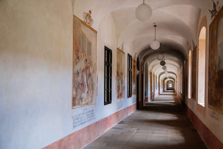 Kuks, East Bohemia, Czech Republic, 10 July 2021: Baroque castle and hospital Kuks, historic interior of old museum, Corridor with restored cycle of murals Dances of Death, Vintage medical background.のeditorial素材