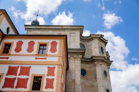 Kuks, East Bohemia, Czech Republic, 10 July 2021: State baroque castle and hospital Kuks with garden and Braun statues, Beautiful complex with chateau and Holy Trinity Church at sunny summer dayのeditorial素材