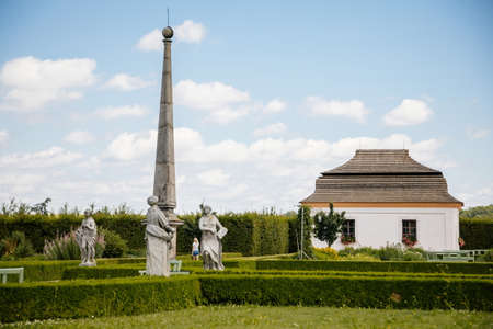 Kuks, East Bohemia, Czech Republic, 10 July 2021: baroque castle and hospital Kuks with herb garden and statues, Beautiful complex with chateau at sunny summer day, flowers, vegetables and fruitsのeditorial素材