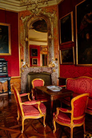 Valtice, Southern Moravia, Czech Republic, 04 July 2021: Castle interior with baroque wooden carved...