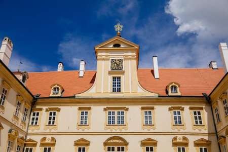 Valtice castle, Southern Moravia, Czech Republic, 04 July 2021: Baroque old historic residences, popular travel destination at sunny summer day, UNESCO world heritage, Sculptures in ornamental garden.のeditorial素材