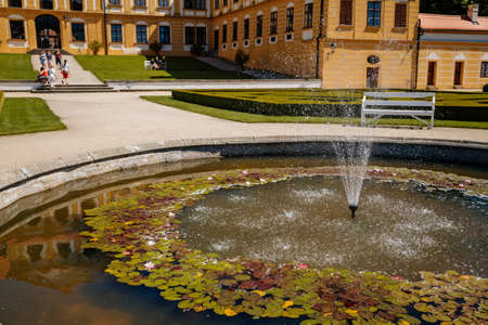 Jaromerice nad Rokytnou, Bohemia, Czech Republic, 06 July 2021: Baroque romantic chateau with park, medieval renaissance castle at summer sunny day, geometrically trimmed green bushes in garden.のeditorial素材