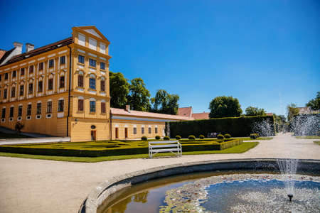 Jaromerice nad Rokytnou, Bohemia, Czech Republic, 06 July 2021: Baroque romantic chateau with park, medieval renaissance castle at summer sunny day, geometrically trimmed green bushes in garden.のeditorial素材
