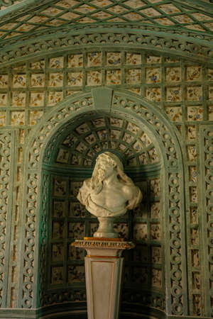 Jaromerice nad Rokytnou, Czech Republic, 06 July 2021: Castle interior of baroque and renaissance castle, green Sala terrena or Roman baths, painted walls with floral ornaments, antique statues.のeditorial素材