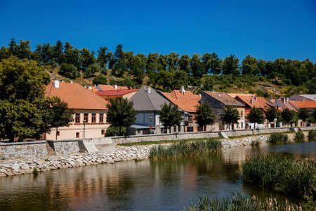 Trebic, Bohemia, Czech Republic, 06 July 2021: Narrow picturesque street with colorful buildings in historic center in medieval city, renaissance and baroque Jewish quarter at summer sunny day.のeditorial素材
