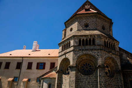 Trebic, Bohemia, Czech Republic, 06 July 2021: medieval castle with museum in historic center, St. Procopius basilica and monastery Romanesque Gothic style, Benedictine herb garden, sunny summer day.のeditorial素材