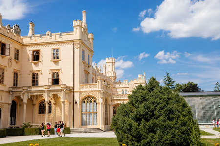 Lednice, Southern Moravia, Czech Republic, 04 July 2021: chateau with beautiful gardens, flower parks on sunny summer day, neo-gothic romantic castle, UNESCO World Heritage, Lednice Valtice Landscape.のeditorial素材