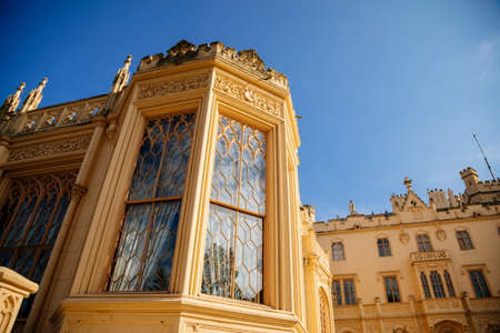 Lednice, Southern Moravia, Czech Republic, 04 July 2021: chateau with beautiful gardens, flower parks on sunny summer day, neo-gothic romantic castle, UNESCO World Heritage, Lednice Valtice Landscape.のeditorial素材