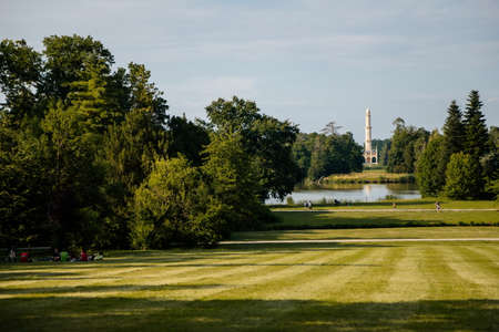 Lednice, Southern Moravia, Czech Republic, 04 July 2021: chateau with beautiful gardens, parks at sunny summer day, Minaret in Moorish style near water channel Dyje, oriental ornaments.のeditorial素材