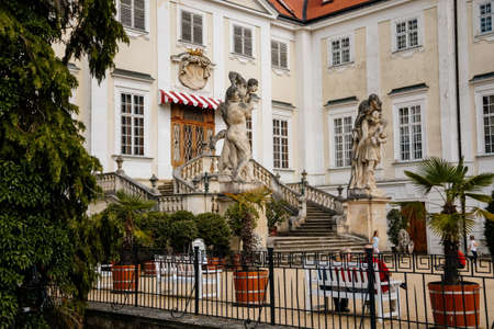 Vranov nad dyji, Southern Moravia, Czech Republic, 03 July 2021: entrance to baroque and gothic medieval castle on hill at sunny summer day, courtyard with antique statues, stairs next to fountain.のeditorial素材