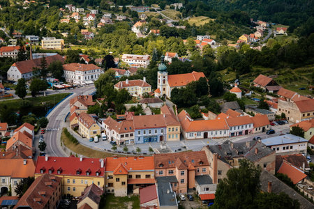 Vranov nad dyji, Southern Moravia, Czech Republic, 03 July 2021: medieval town on river bank, Narrow picturesque street with gothic, renaissance and baroque historical buildings at summer sunny day.のeditorial素材
