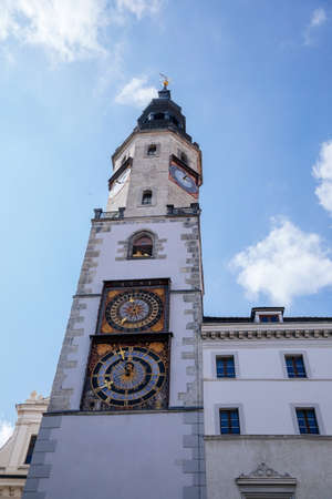 Goerlitz, Saxony, Germany, 04 September 2021: Historical Town hall or Rathaus, antique clock with two dials and moon calender on tower at Lower Market Square or Untermarkt at sunny summer day.のeditorial素材