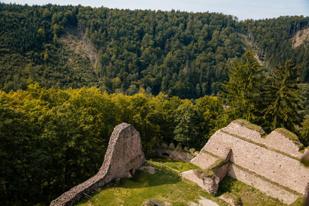Litice nad Orlici, Eastern Bohemia, Czech Republic, 11 September 2021: Ruins of medieval castle on hill, old stronghold with stone tower, ancient gothic fortress, sunny day, landmark in countryside.のeditorial素材