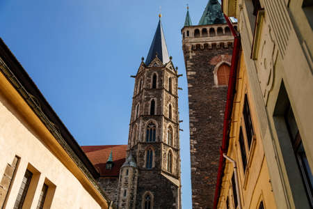 Kolin, Central Bohemia, Czech republic, 10 July 2021: Medieval stone St. Bartholomew? S Church with tower in sunny summer day, arched windows, chimeras and gargoyles, Gothic Cathedral with belfry.のeditorial素材