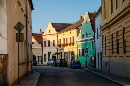 Trebon, South Bohemia, Czech Republic, 9 October 2021: Narrow picturesque street with colorful buildings in historic center of medieval city, renaissance, baroque and gothic houses at sunny dayのeditorial素材