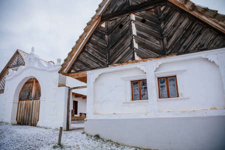Kourim, Central Bohemia, Czech Republic, 26 December 2021: Traditional rural village wooden house in winter, historic country-style architecture, Christmas in Skanzen, open-air ethnographic museumのeditorial素材
