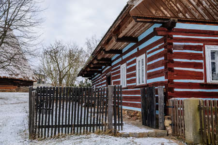 Kourim, Central Bohemia, Czech Republic, 26 December 2021: Traditional rural village wooden house in winter, historic country-style architecture, Christmas in Skanzen, open-air ethnographic museumのeditorial素材