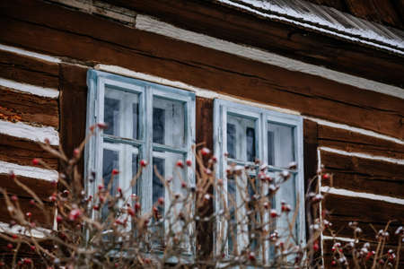 Kourim, Central Bohemia, Czech Republic, 26 December 2021: Traditional rural village wooden house in winter, historic country-style architecture, Christmas in Skanzen, open-air ethnographic museumのeditorial素材