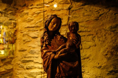 Kolin, Czech Republic, 26 December 2021: Regional Museum Town House Cervinkovsky dum, old stone cellar, antique stained glass and statues at an exhibition dedicated to ancient historyのeditorial素材