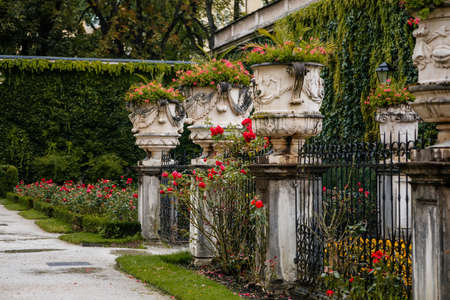 Salzburg, Austria, 28 August 2021: Famous Mirabell gardens near palace, geometrically arranged park,...