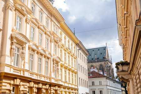 Linz, Austria, 27 August 2021: Narrow picturesque street, Facade of colorful buildings in historic...