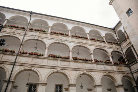 Linz, Austria, 29 August 2021: Landhaus Parliament of Upper Austria, Facade of colorful baroque buildings in historic center of medieval city, summer day, fountain Planetenbrunnen, renaissance arcadesのeditorial素材
