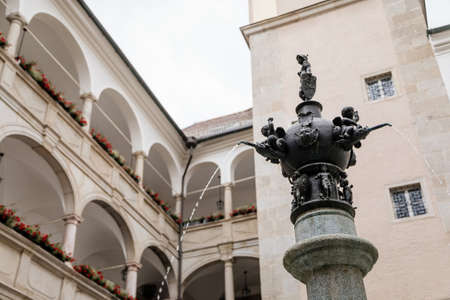 Linz, Austria, 29 August 2021: Landhaus Parliament of Upper Austria, Facade of colorful baroque buildings in historic center of medieval city, summer day, fountain Planetenbrunnen, renaissance arcadesのeditorial素材
