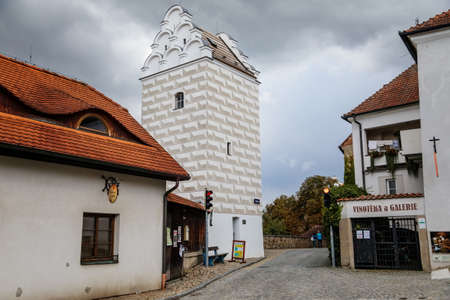 Tabor, South Bohemia, Czech Republic, 29 August 2021: Narrow medieval square with baroque and renaissance historical buildings, water tower with Sgraffito, cityscape of medieval town in summer dayのeditorial素材