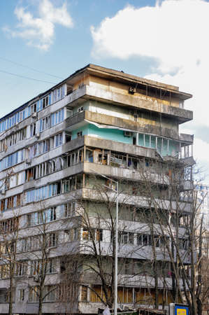 Kyiv, Ukraine, 17 March 2022: War of Russia against Ukraine. A residential building damaged by enemy aircraft in Ukrainian capital Kyiv, apartments destroyed following Russian rocket attack cityのeditorial素材