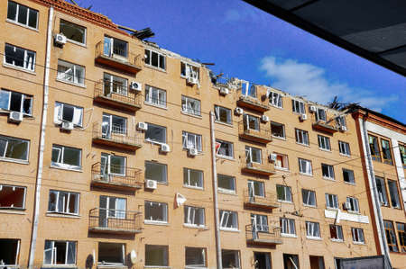 Kyiv, Ukraine, 17 March 2022: War of Russia against Ukraine. A residential building damaged by enemy aircraft in Ukrainian capital Kyiv, apartments destroyed following Russian rocket attack cityのeditorial素材