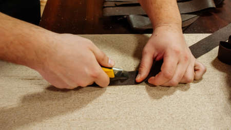 Kyiv, Ukraine, 7 April 2022: Civilian volunteers weave and knit camouflage nets for Ukrainian Military, sewing and craft cover camouflage for army troops, people woman and children mobilize to helpのeditorial素材