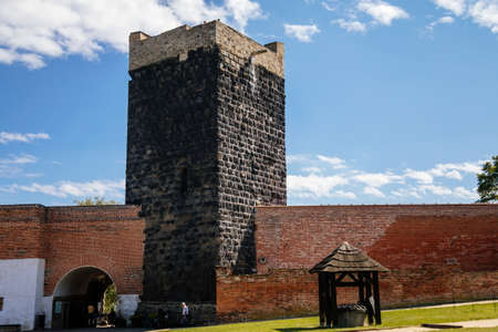 Cheb, Western Bohemia, Czech Republic, 14 August 2021: Gothic stone castle, medieval historic fortress or stronghold in sunny summer day, black Tower, ballista wooden siege weapons near defense wallsのeditorial素材