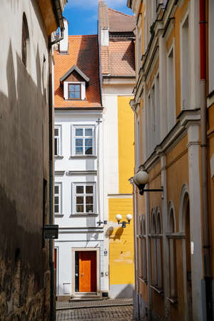 Cheb, Western Bohemia, Czech Republic, 14 August 2021: narrow picturesque street with medieval colorful gothic merchant houses, Eger at sunny summer day, historic renaissance and baroque buildingsのeditorial素材