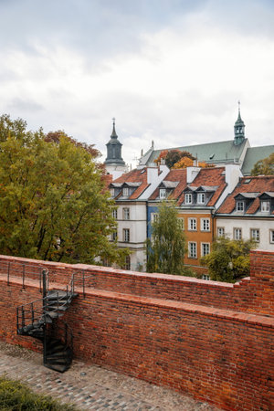 Warsaw, Poland, 13 October 2021: Barbican complex network of historic fortifications between Old and New Town, red brick fort wall with towers, major tourist attraction at sunny autumn day, city gateのeditorial素材