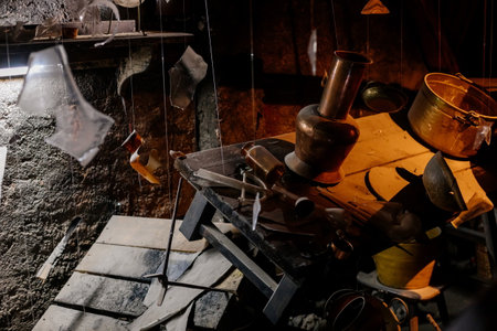 Prague, Czech Republic, 2 October 2022: Museum of Alchemists and Magicians, flasks, retorts and other chemical glassware and equipment for experiments in laboratory, Mystic manuscripts and herbsのeditorial素材