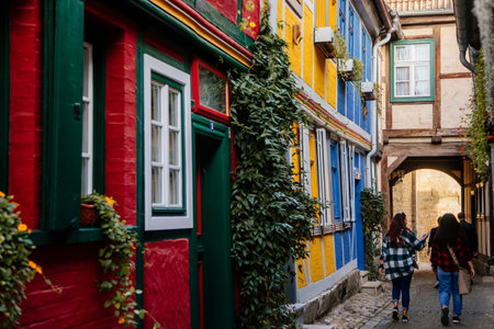 Quedlinburg, Saxony-Anhalt, Germany, 28 October 2022: Schuhhof or cobbler street, Historic old vintage colored timber frame houses in medieval town, half-timbered home at sunny autumn dayのeditorial素材