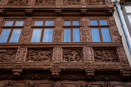Wernigerode, Saxony-Anhalt, Germany, 29 October 2022: Krummelsches Haus or Krummel's house, Historic old vintage colored timber frame houses with carvings in medieval town, home at sunny dayのeditorial素材