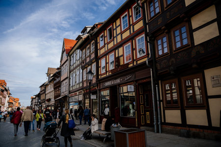 Wernigerode, Saxony-Anhalt, Germany, 29 October 2022: Historic old vintage colored timber frame houses in medieval town, UNESCO World Heritage city, half-timbered home at sunny autumn day, cobblestoneのeditorial素材