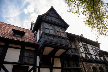 Wernigerode, Saxony-Anhalt, Germany, 29 October 2022: Gadenstedtsches Haus or Gadenstedt's house, Historic old vintage colored timber frame houses in medieval town, half-timbered home at sunny dayのeditorial素材