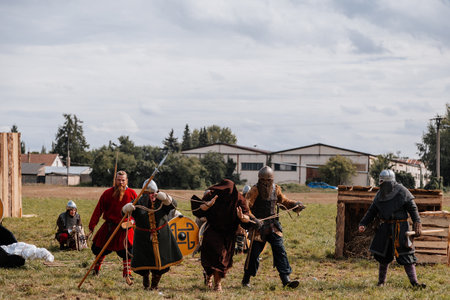 Privory Vsetaty, Czech Republic, 2 September 2023: Reconstruction of medieval battle, Historical festival, Armored Knights, Dark Ages Army formation, Vikings pagans torture Christian monkのeditorial素材