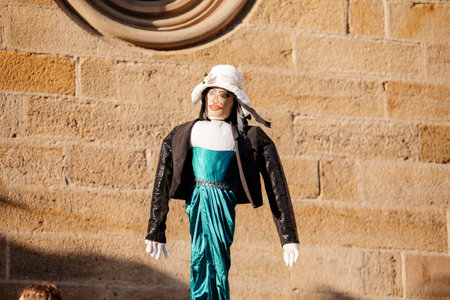 Prague, Czech Republic, 30 April 2023: Carodejnice festival or Walpurgis night, witch effigy is being carried to bonfire it will be burnt, spring welcoming ritual, Costumed men and women in streetsのeditorial素材