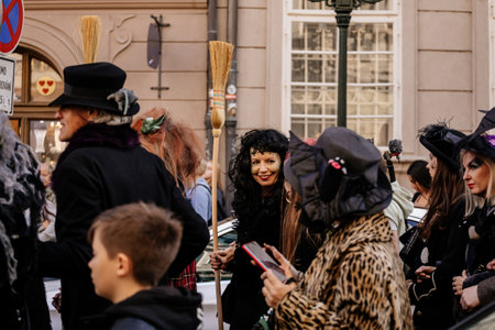 Prague, Czech Republic, 30 April 2023: Carodejnice festival or Walpurgis night, witch effigy is being carried to bonfire it will be burnt, spring welcoming ritual, Costumed men and women in streetsのeditorial素材