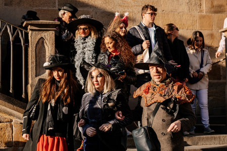 Prague, Czech Republic, 30 April 2023: Carodejnice festival or Walpurgis night, witch effigy is being carried to bonfire it will be burnt, spring welcoming ritual, Costumed men and women in streetsのeditorial素材