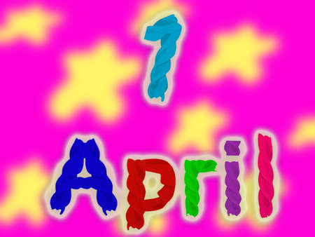 The inscription April 1 from bright colored pasta on a bright pink backgroundの写真素材
