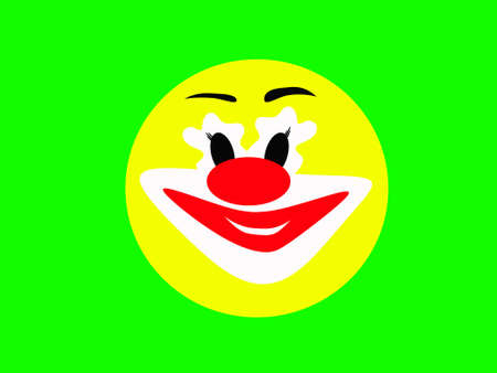 Round laughing face of a merry clown on a green backgroundの写真素材
